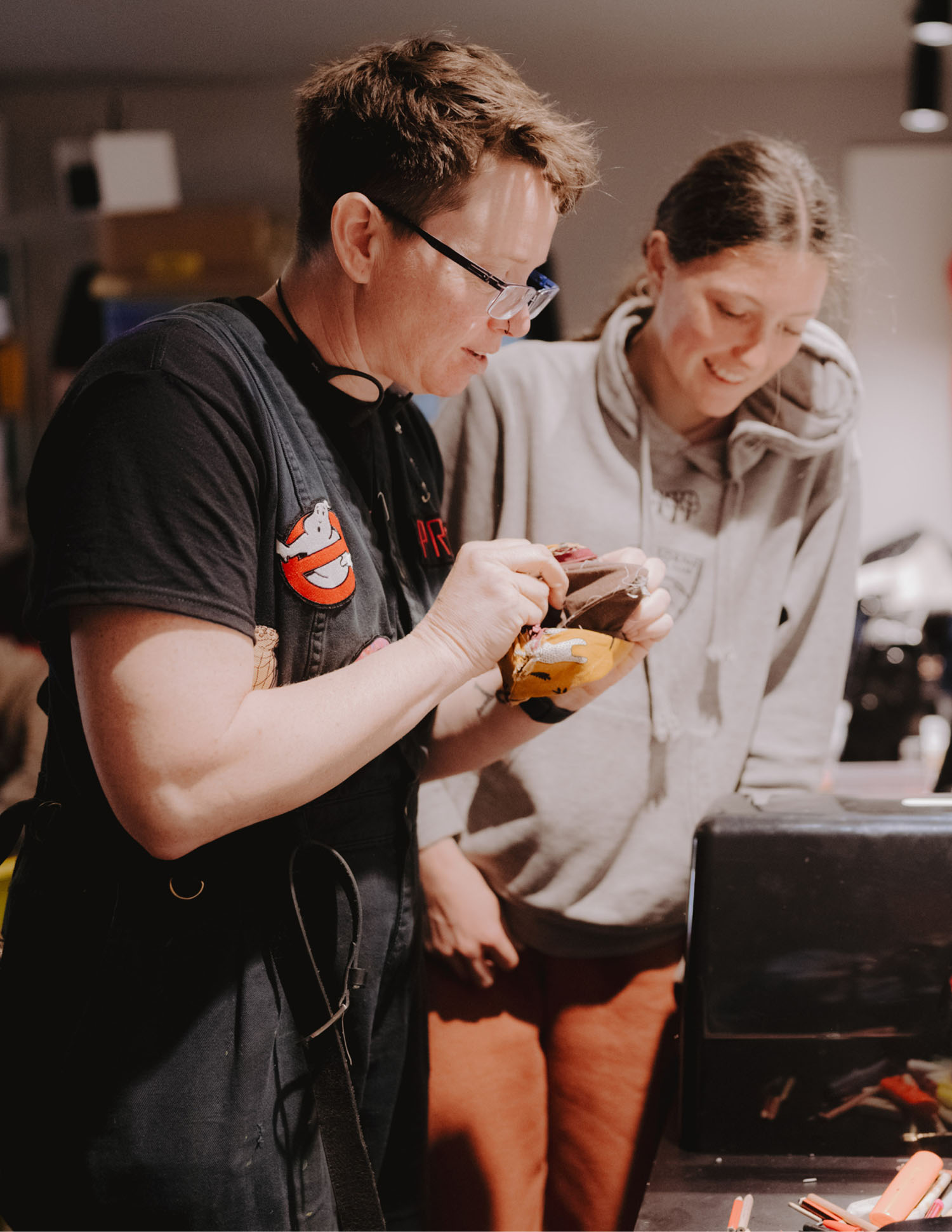 Alice Miller School Teacher helping a student